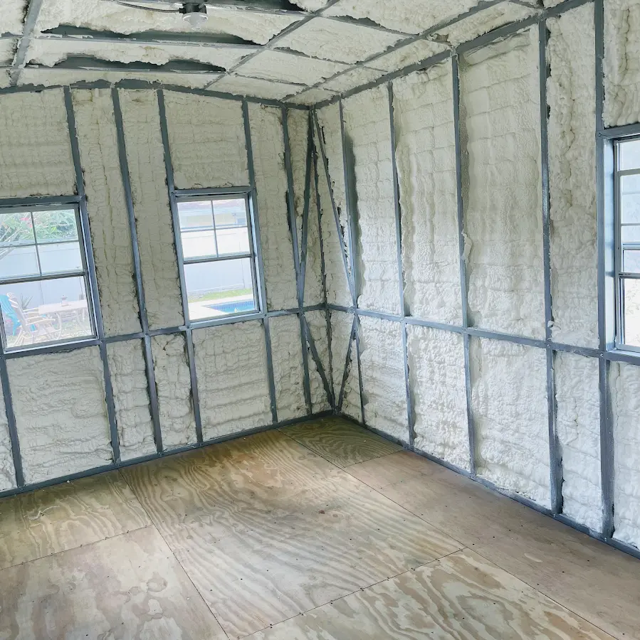 Closed-cell spray foam insulation applied to wall cavities in a residential project in Eastvale